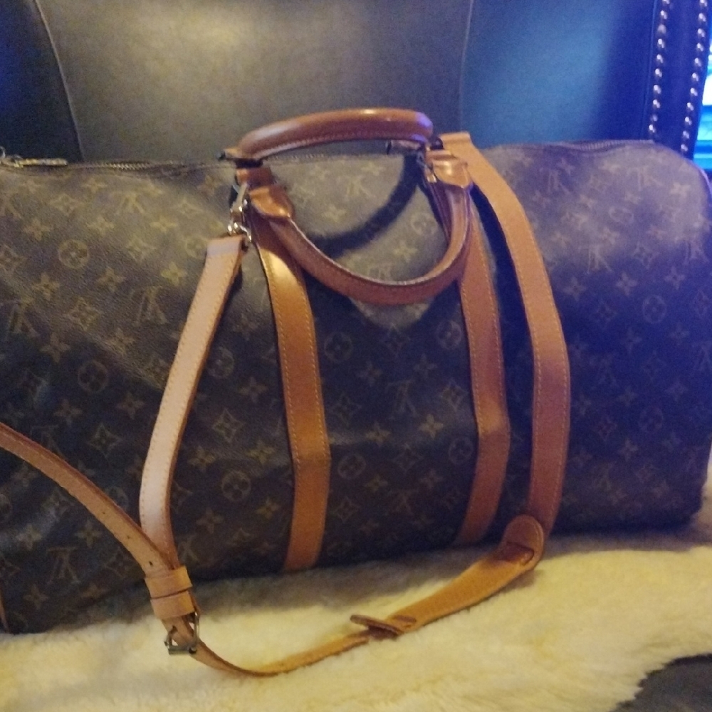 Louis Vuitton Travel Duffle Luggage.